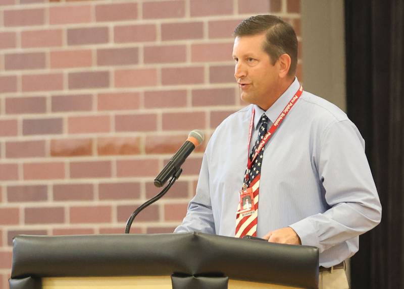 Brent Ziegler, principal at Parkside Middle School, welcomes visitors and students to the Parkside Middle School Veterans Day program on Tuesday, Nov. 11, 2025 in Peru.