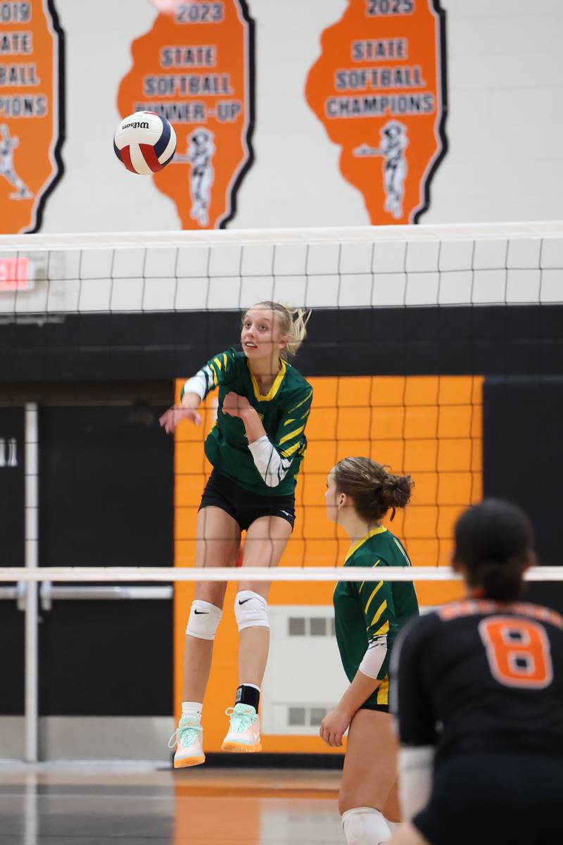 Grant Park's Taylor Panozzo hits from the back row during the Dragon's loss in two sets, 25-22, 25-23, to Beecher in the RVC championship game on Monday, Oct. 20, 2025, at Beecher High School.