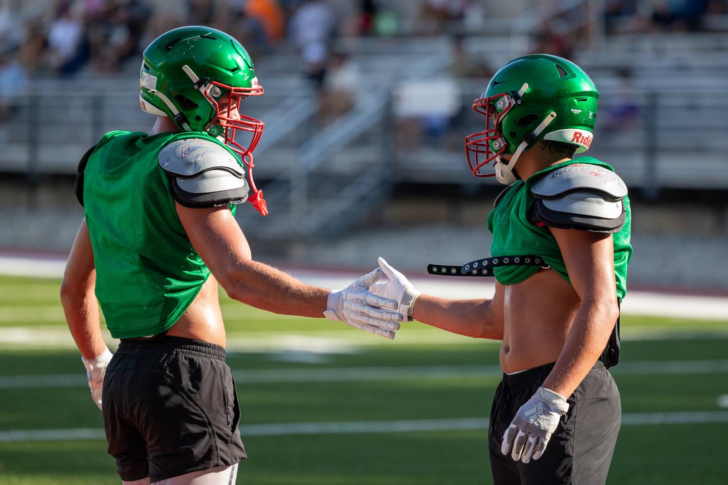(left to right) Griffin May and Ryland Rynkewicz of L-P perform handshake during scrimmage on Tuesday July 16, 2025 at Howard Fellows Stadium in LaSalle.