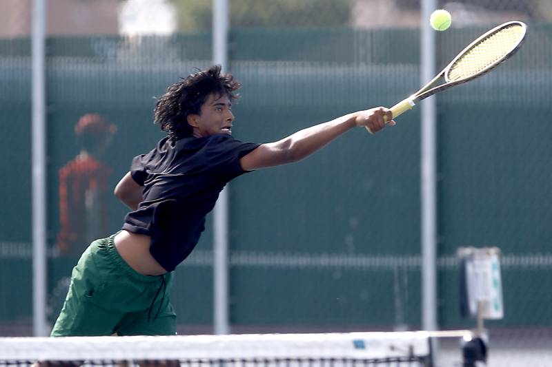 Stevenson’s Nikhil Vijayakumar returns the ball as he competes in the Class 2A Boys State Tennis Tournament on Thursday, May 23, 2024, at Hersey High School in Arlington Heights.