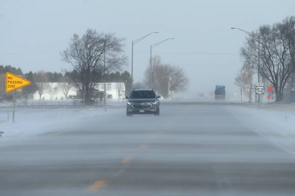 Thunderstorms will give way to snow possibly across northern Illinois as cold front moves in 
