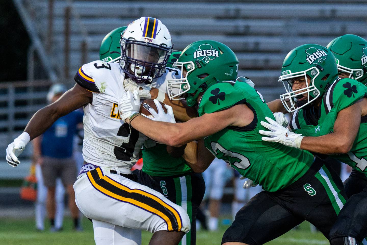 (from left) Joshuah Crawford (3) of Chicago Christain is held by Brady Sheedy (23) of Seneca on Friday, Aug 29, 2025 at Seneca High School in Seneca.