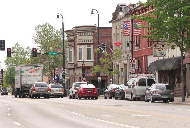 Traffic stops at the light at the intersection of Lincoln Highway and Second Street Tuesday, May 24, 2022 in DeKalb. Road construction will be starting soon on the section of Lincoln Highway between First and Fourth Streets.