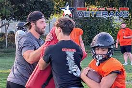 Military experience helped McHenry coach Derek Franzen discover life passion