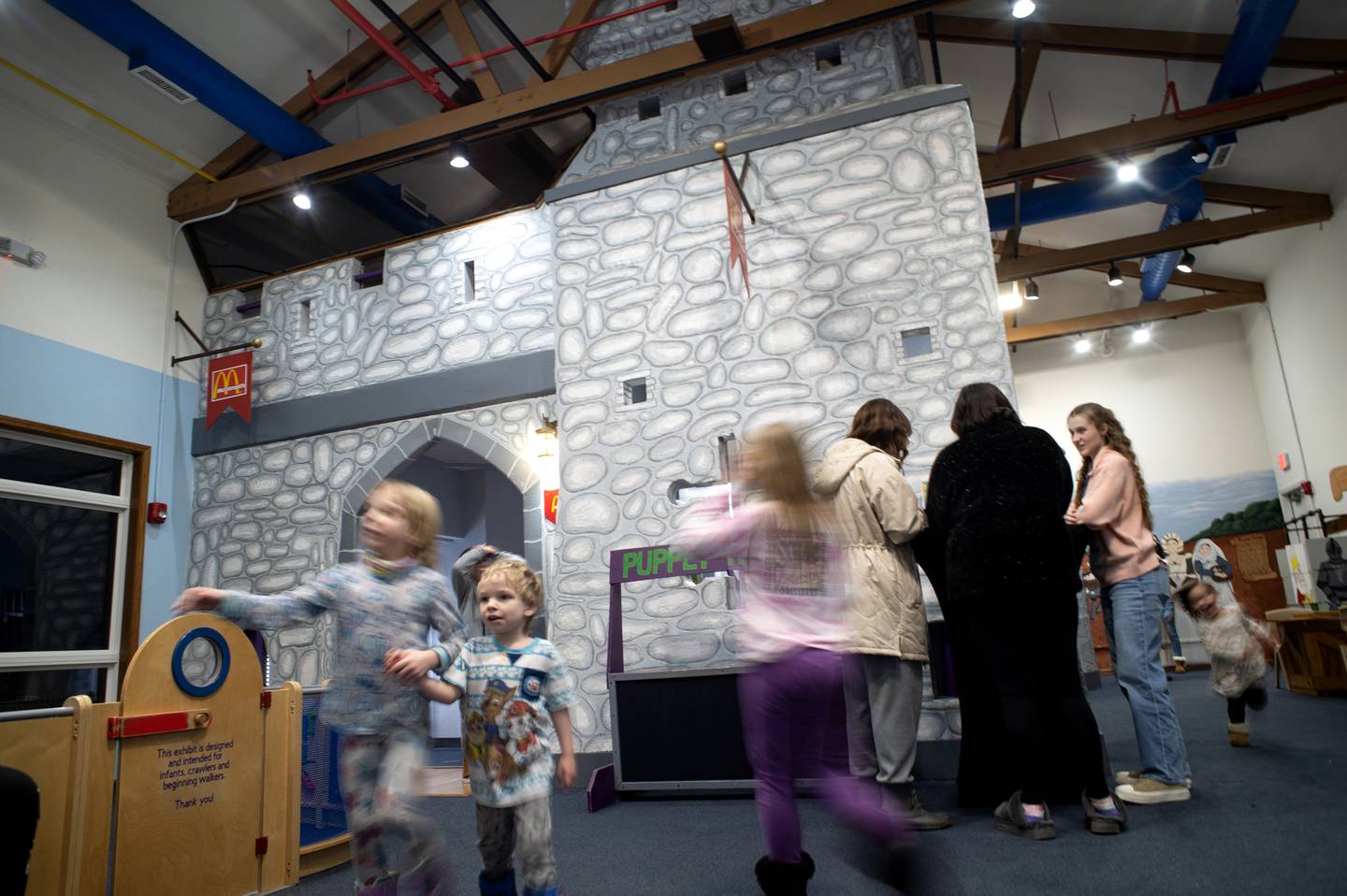 Children play in and around the castle in the Exploration Station at Perry Farm Park during an open house and farewell party for the long-lived castle Feb. 21, 2025.