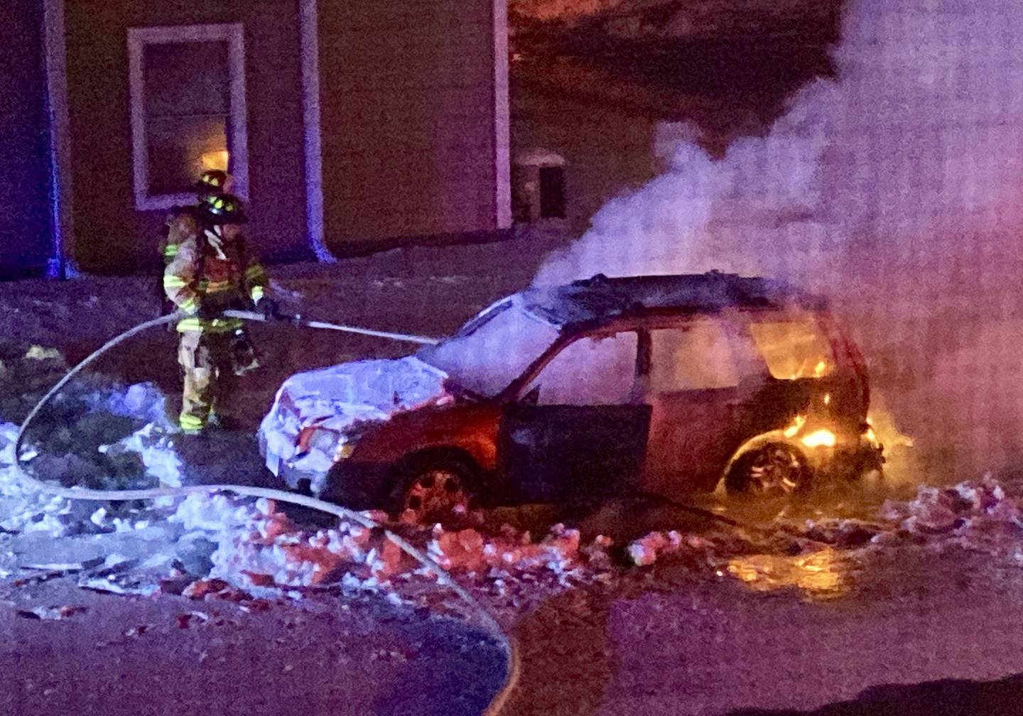 A vehicle caught fire about 7:30 p.m. Sunday, Jan. 14, 2024, outside a Stone Prairie apartment building on Sycamore's east side. Sycamore firefighters and police responded to the fire.