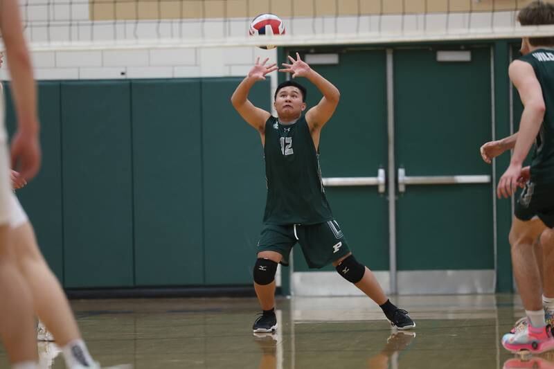 Plainfield Central’s Matthew Aparri receives the serve against Joliet West on Tuesday, April 23, 2024 in Plainfield.