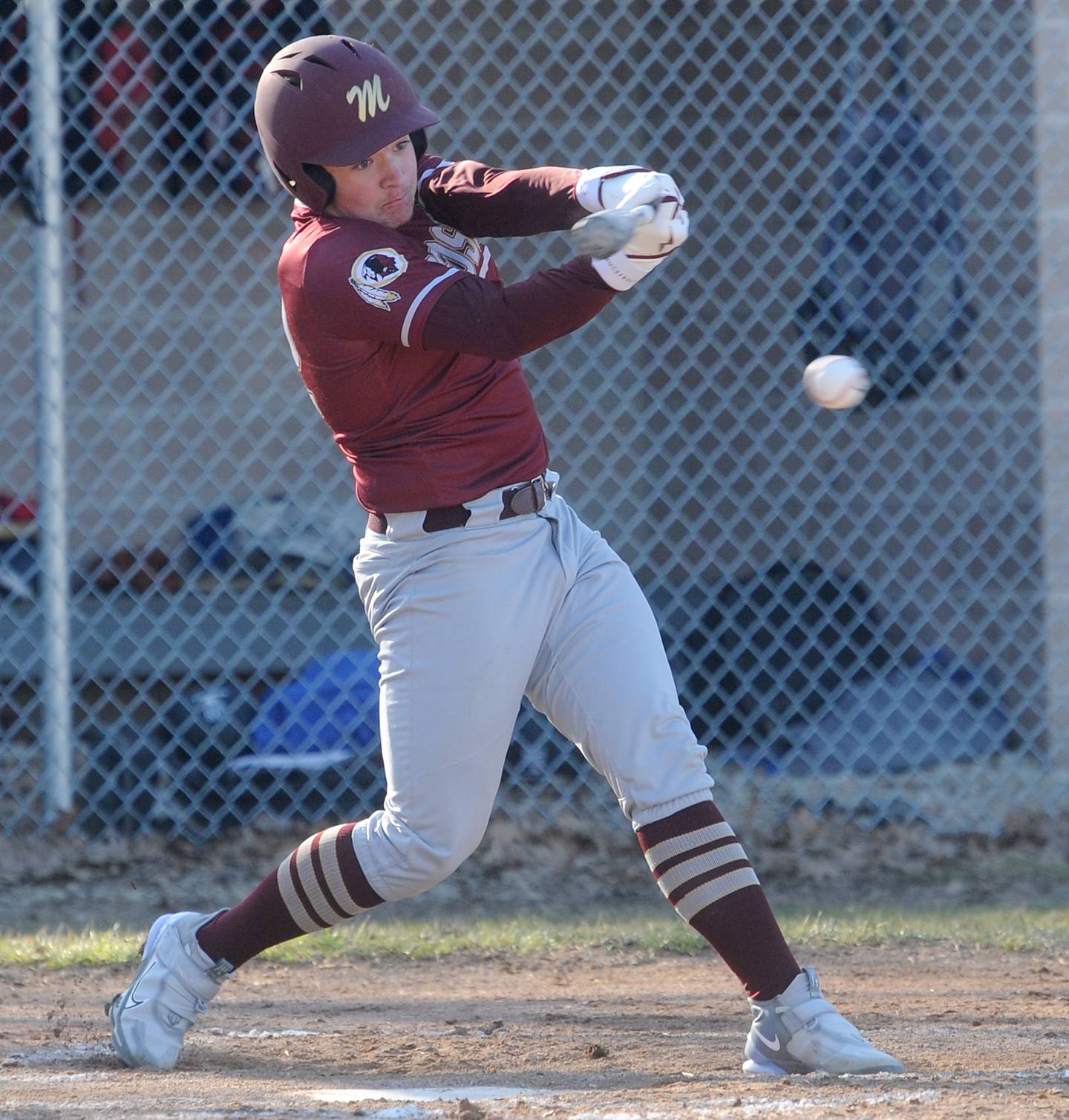 Morris batter A.J. Franzetti puts a ball in play during a varsity baseball game at Newark High School on Wednesday, Mar. 29, 2023.