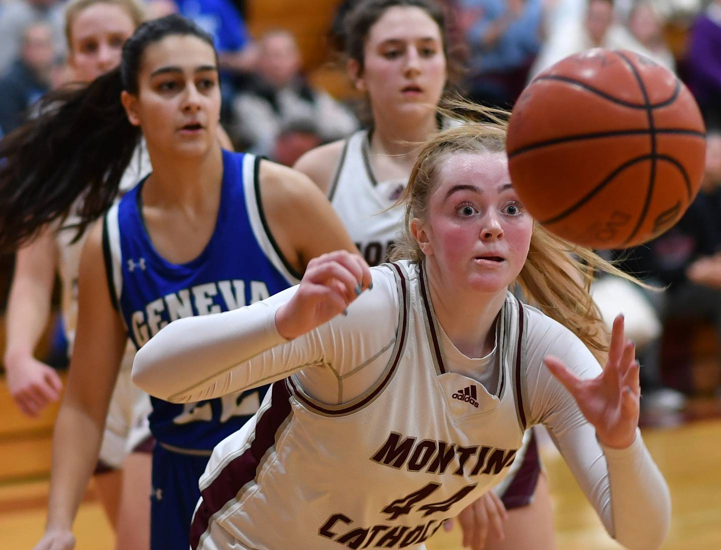Montini's Ellie Helm (44) goes after a loose ball during a Coach Kipp Hoopsfest game against Geneva on Jan. 14, 2023 at Montini Catholic High School in Lombard.