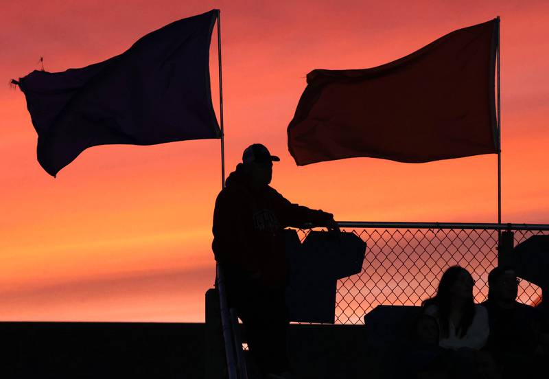 A Genoa-Kingston fan waits for kickoff of their game against Winnebago Friday, Sept. 27, 2024, at Genoa-Kingston High School.