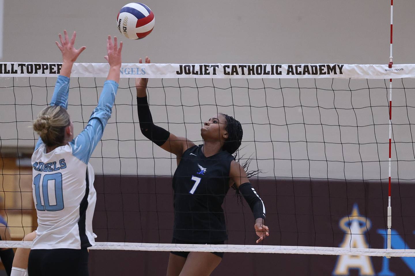 Lincoln-Way East's Kolby Ross pushes over a shot against Joliet Catholic on Monday, Sept. 23, 2024 in Joliet.