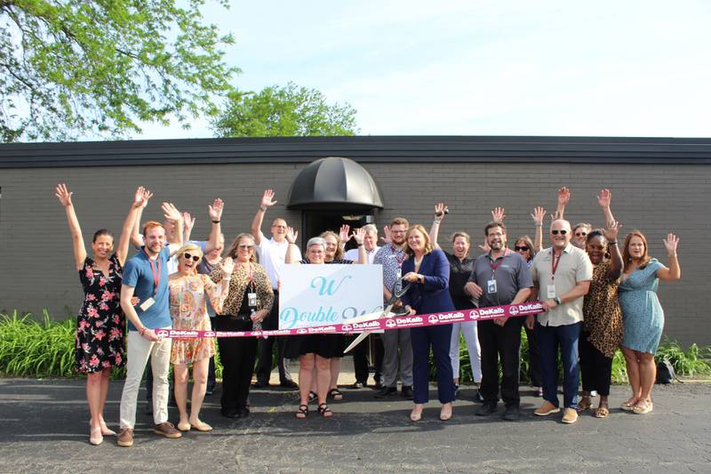The DeKalb Chamber of Commerce celebrating Double W Financial Group's opening