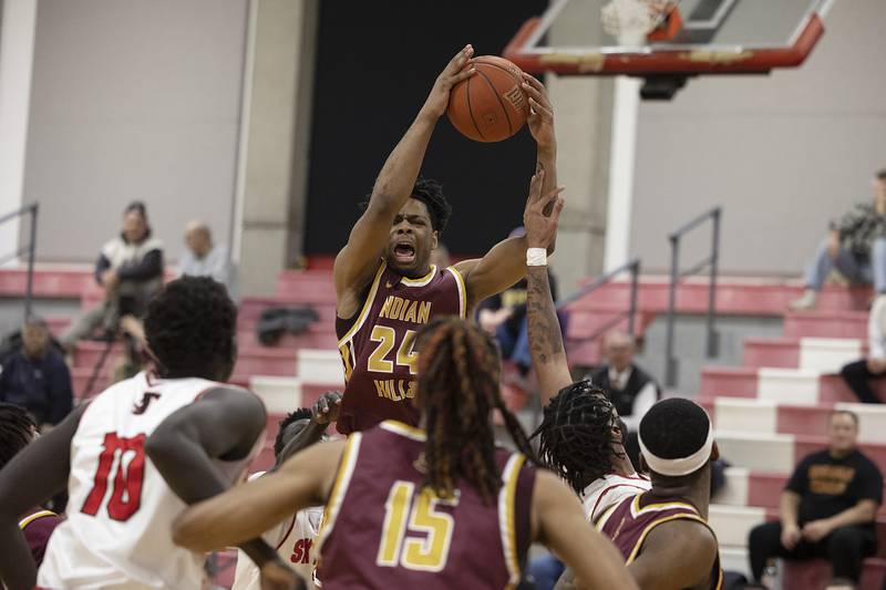 Indian Hills’ Trevion LaBeaux pulls down a rebound against Sauk Valley Monday, Jan. 30, 2023.