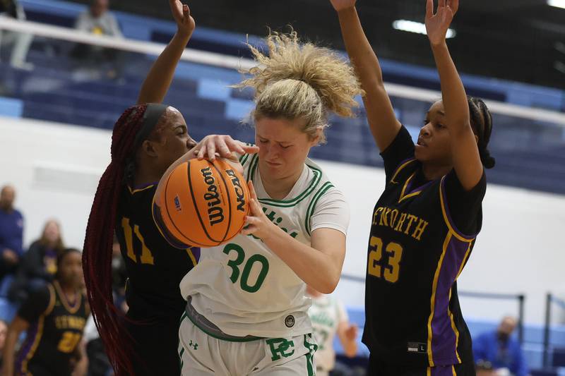 Providence’s Kennady Kotowski battles for the ball against Thornton Fractional North in the Class 3A Hillcrest Sectional semifinal game on Tuesday, Feb. 24, 2026 in Hillcrest.