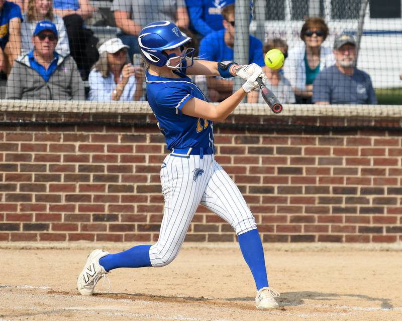 Wheaton North's Makayla Hammer (11) makes contact with the ball during the sectional semifinal game on Thursday June 5, 2025, while taking on Weaton Warrenville South held at Oswego High School.