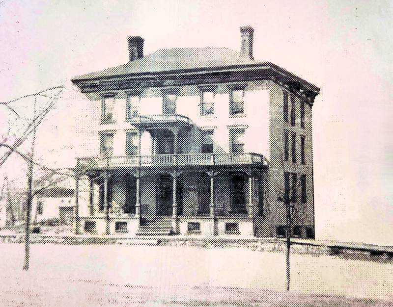 This photo, which now hangs in the Nachusa House lobby, is likely the earliest known image of the hotel. A fifth story, not present in this photo, was added in 1867.