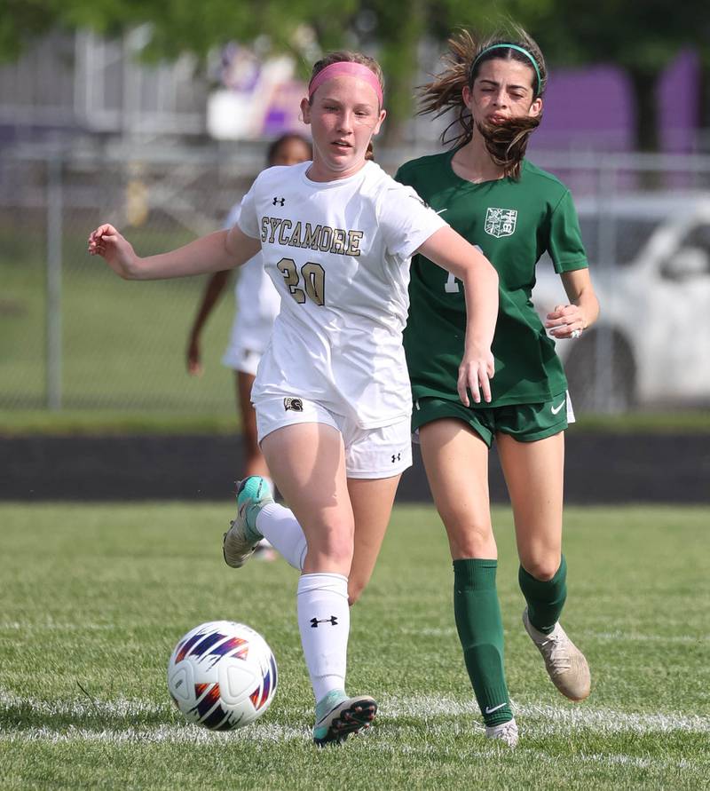 Sycamore's Cortni Kruizenga and Boylan's Joscelyn Posada chase down the ball during their Class 2A sectional semifinal game Tuesday, May 21, 2024, at Belvidere High School.