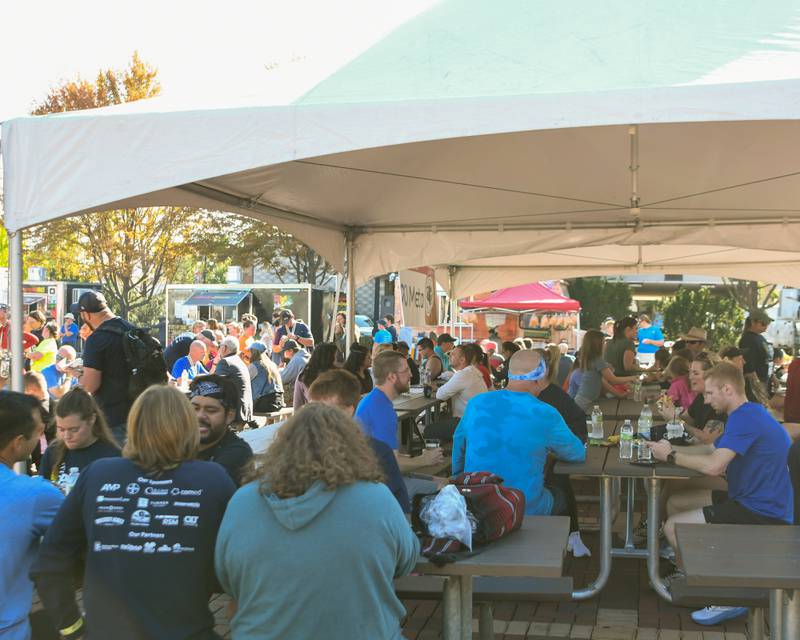 Community members enjoy food, drinks and live music during the Taste of DeKalb on Sunday, Sept. 29, 2024.