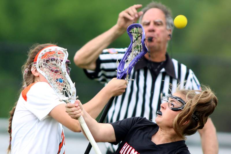 Crystal Lake Central United’s Anna Starr, left, battles Huntley’s Leah Holmberg in IHSA Sectional Title Game action at Crystal Lake Central High School in Crystal Lake on Friday, May 30, 2025.