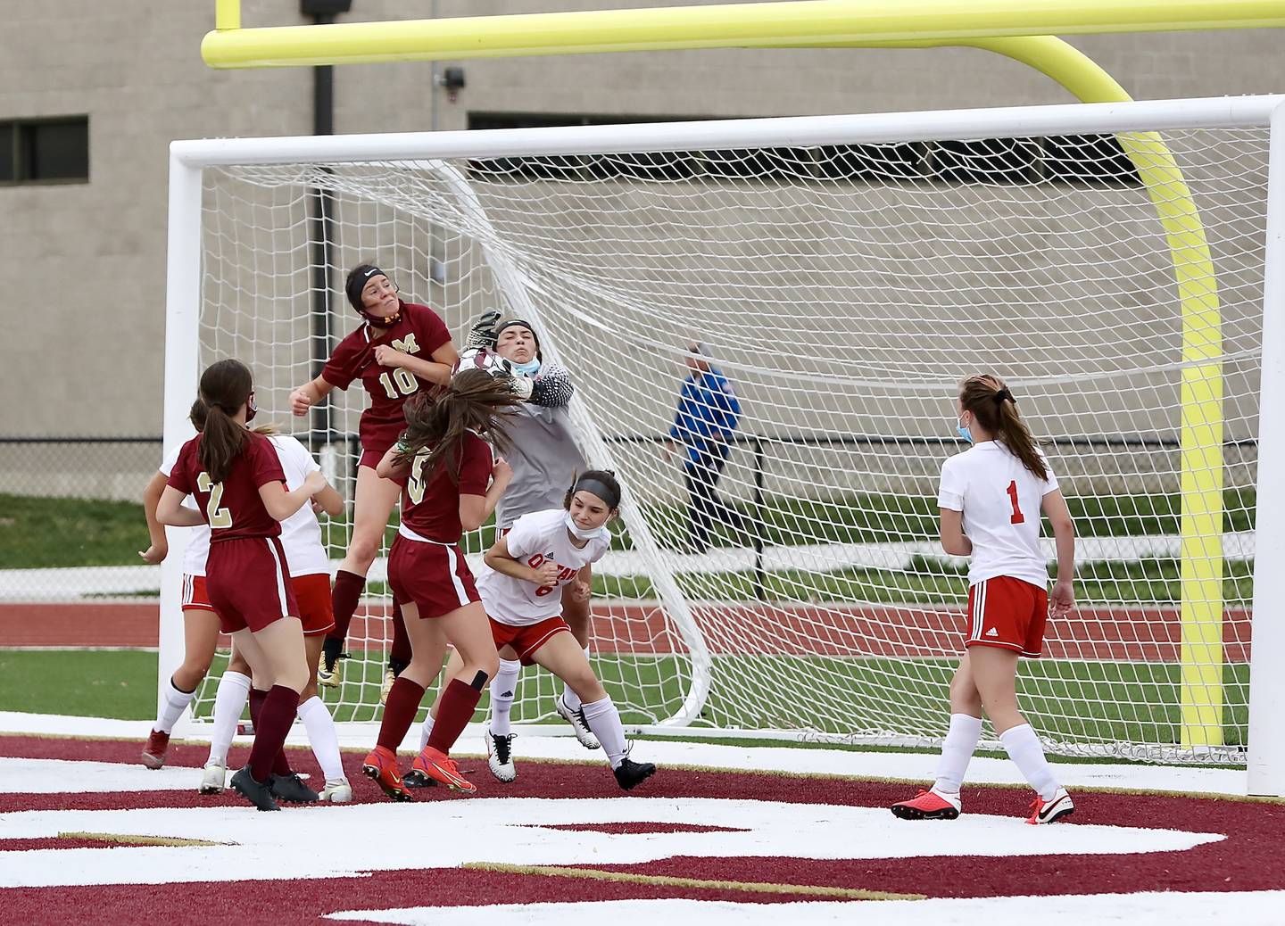 The defense and goal keeper for Ottawa (white jerseys) were kept busy most of the game Tuesday, May 25, 2021, in a 6-1 loss to Morris.