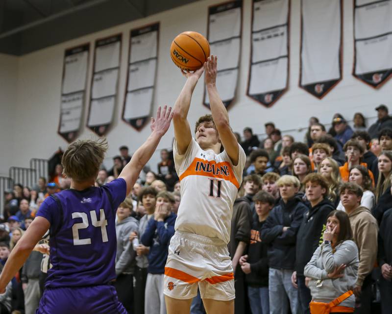 Sandwich's Nicholas Michalek (11) shoots a jumper during their basketball game between Sandwich at Plano Tuesday, Jan 27, 2026 in Sandwich.