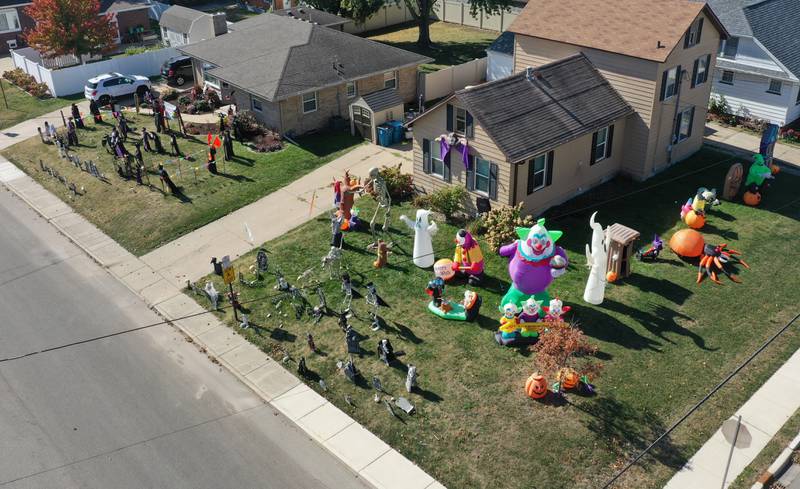 An aerial photo of two Halloween homes at the corner of West Street and 7th Street on Thursday, Oct. 17, 2024 in Peru.