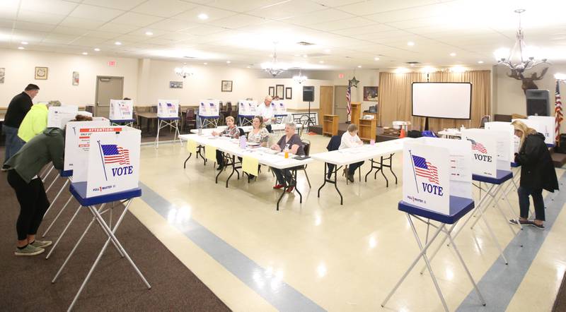 Voters fill out their ballots inside the Moose Lodge on Tuesday, Nov. 5, 2024 in Princeton.