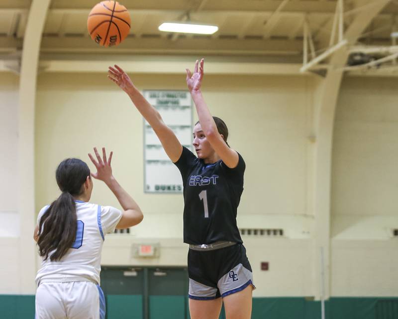 Oswego East's Aubrey Lamberti (1) shoots a jumper during their York Thanksgiving Tournament matchup between Oswego East at Downers Grove South Friday, Nov 20, 2025 in Elmhurst.