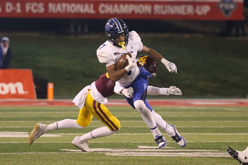 Lincoln-Way East’s DJ Richardson heads upfield after a catch against Loyola in the Class 8A championship on Saturday, Nov. 25, 2023 at Hancock Stadium in Normal.