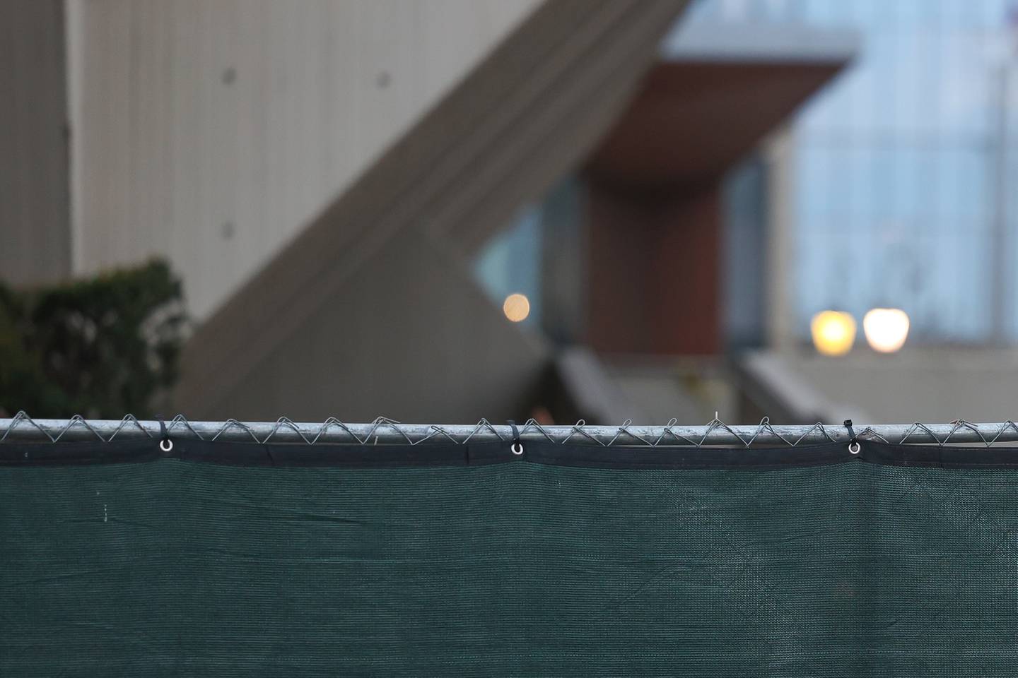 Fencing is put up around the old courthouse in preparation for demolition in downtown Joliet on Tuesday, Dec. 5, 2023.