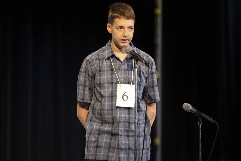 Rochelle Middle School eighth grader Noah McKinney appears on stage Thursday, March 9, 2023 during the Lee-Ogle-Whiteside Regional Spelling Bee.