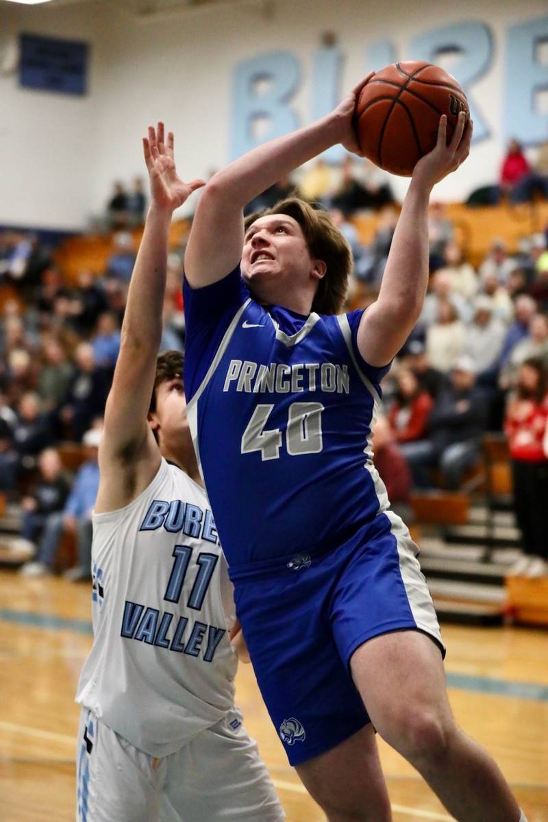 Princeton's Jordan Reinhardt shoots over Bureau Valley's Logan Philhower at the Storm Cellar Thursday night. The Storm won 62-56.