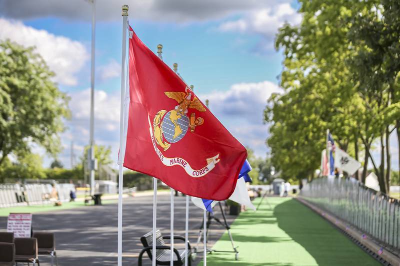 Flags representing all of the Military forces at the Vietnam Traveling Memorial Wall Thursday, Aug 21, 2025  in Romeoville.