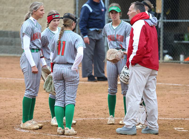 LaSalle-Peru head coach Randy Huebbe visits the mound Thursday, April 30, 2026, during their game at Sycamore High School.