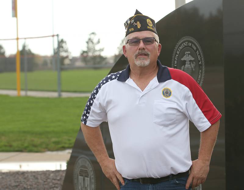 Dennis Znaniecki commander of the American Legion Post 375 in Peru poses for a photo at the  Veterans Memorial on Thursday, Oct. 26, 2023 at Veterans Memorial Park in Peru.