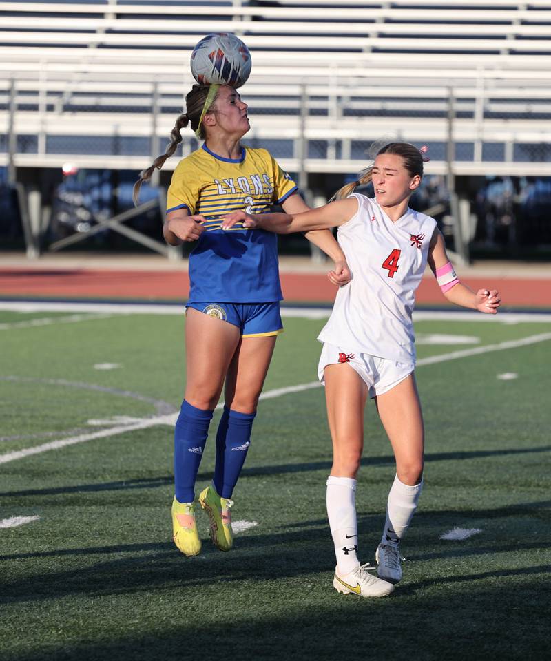 Lyons Township's Josie Pochocki (2) heads the ball during the IHSA Class 3A girls soccer sectional final match between Lyons Township and Hinsdale Central at Reavis High School in Burbank on Friday, May 26, 2023.