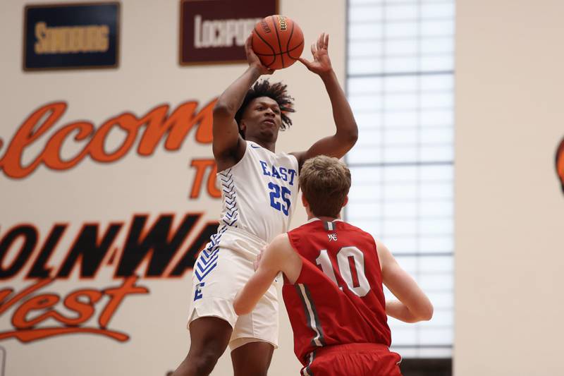 Lincoln-Way East’s George Bellevue puts up a shot against Hinsdale Central in the Lincoln-Way West Warrior Showdown on Saturday January 28th, 2023.