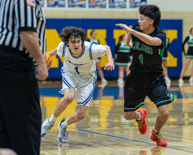 Austin Reibel (1) of Newark dribbles ball past Leland's defender Isaac Risch (1) during the quarterfinals of the Little Ten Conference Tournament on Monday, Feb. 2, 2026 at Somonauk High School in Somonauk.