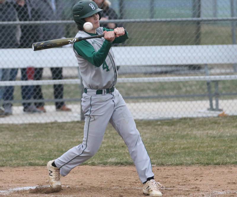St. Bede's John Brady swings and misses at a high pitch against Ottawa on Wednesday, March 22, 2023 at Ottawa High School.