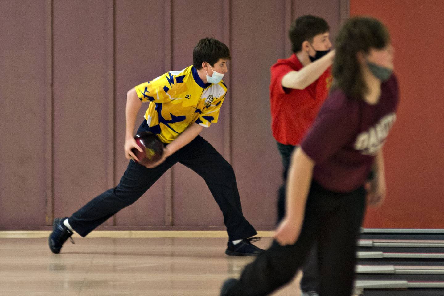 Sterling's Mikah Hernandez makes his approach during bowling regionals in Sterling on Saturday, Jan. 15, 2022.