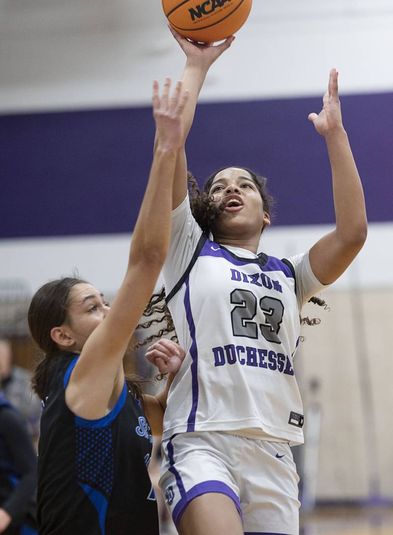 Dixon’s Ahmyrie McGowan puts up a shot against St. Francis’ Courtney Bridgeforth Saturday, Jan. 10, 2026.