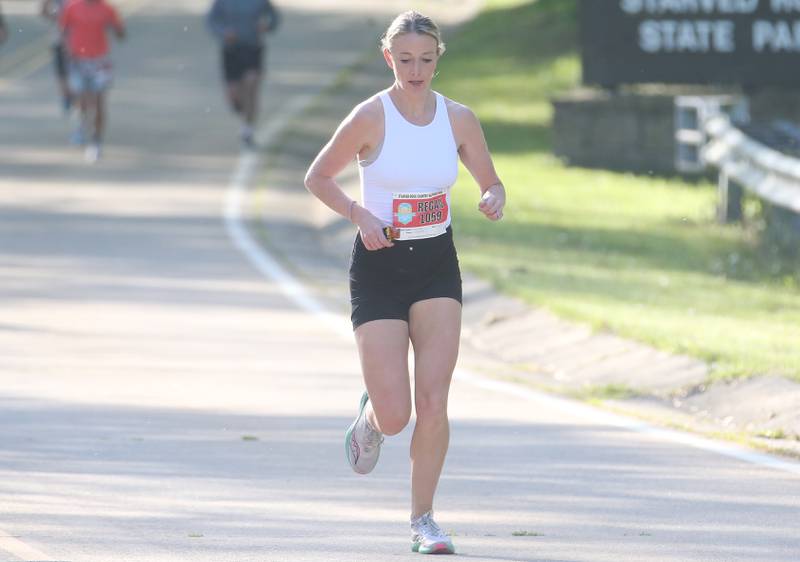 Regan Shipp of Deer Grove, runs in the Starved Rock Country half-marathon on Saturday, May 10, 2025 at Starved Rock State Park.