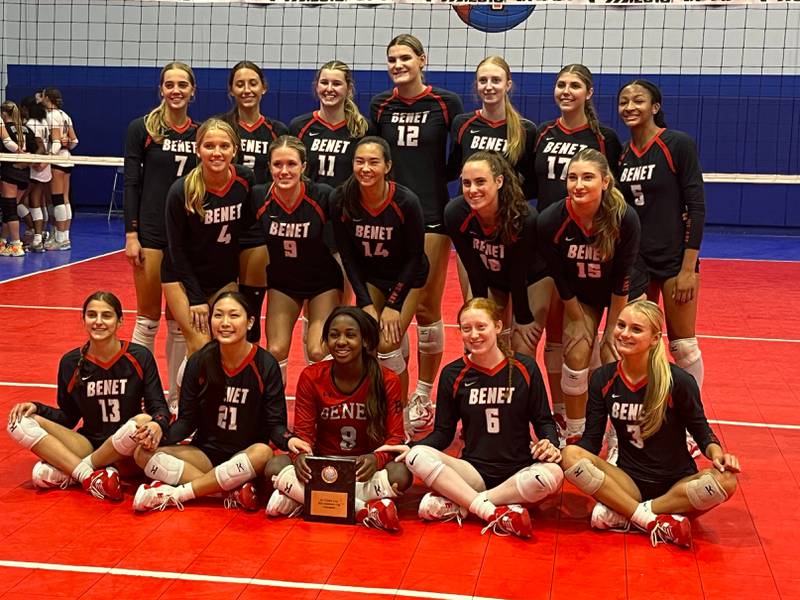 The Benet volleyball team poses after winning the Scholastic Cup volleyball tournament on Saturday at Great Lakes Center in Aurora.