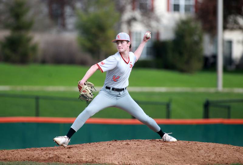 St. Charles East's Nathan Beers pitches during a game against Wheaton North on Wednesday, April 23, 2025 in St. Charles.