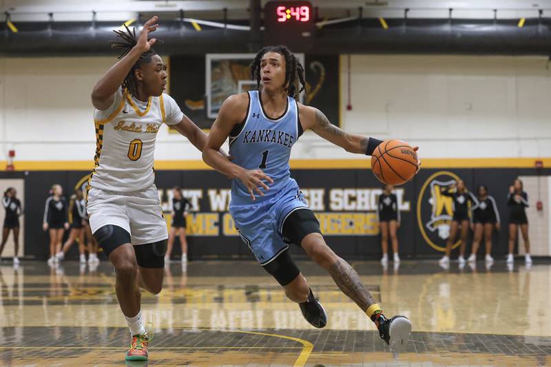 Kankakee’s Lincoln Williams drives to the basket against Joliet West on Wednesday, Feb. 18, 2026 in Joliet.