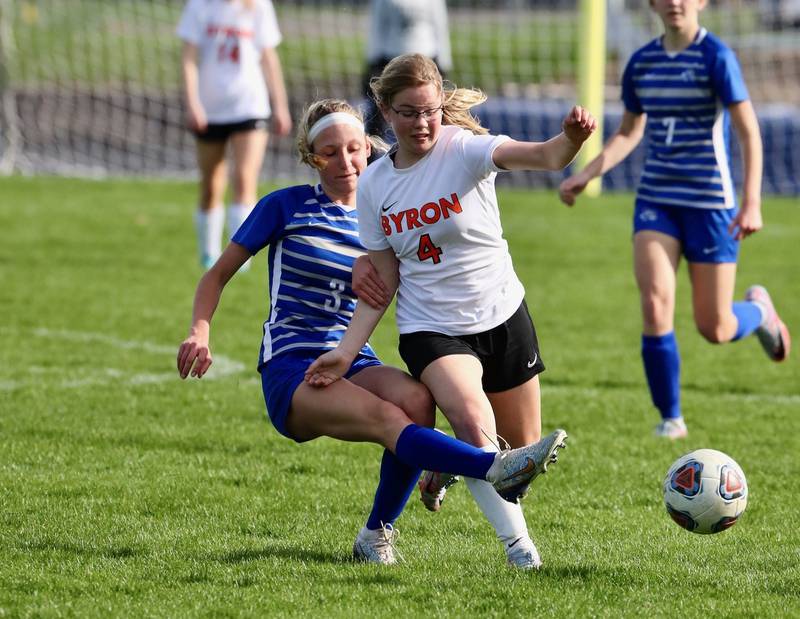 PHS freshmen Chloe Ostrowski battles for the ball against Byron Thursday night at Bryant Field.