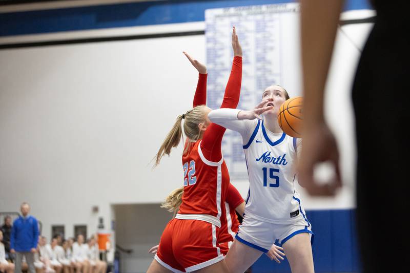 St. Charles North's Browyn How looks to put up a shot against Batavia on Friday, Dec.12,2025 in st. Charles.