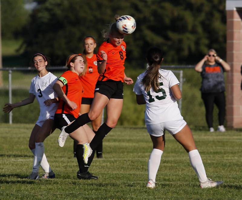 Crystal Lake Central's Olivia Anderson heads the ball in front of Boylan's Karime Ibarra during the IHSA Class 2A Burlington Central Girls Soccer Sectional final match Friday, May 26, 2023, at Burlington Central High School.