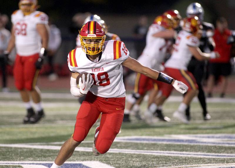 Batavia’s C.J. Valente carries the ball during a game at St. Charles North on Friday, Sept. 15, 2023.