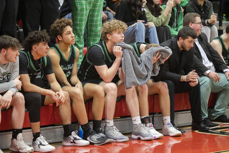 The Rock Falls Rockets watch the final seconds of their 66-46 loss to Rockridge Wednesday, March 1, 2023 in the Orion 2A sectional semifinal.